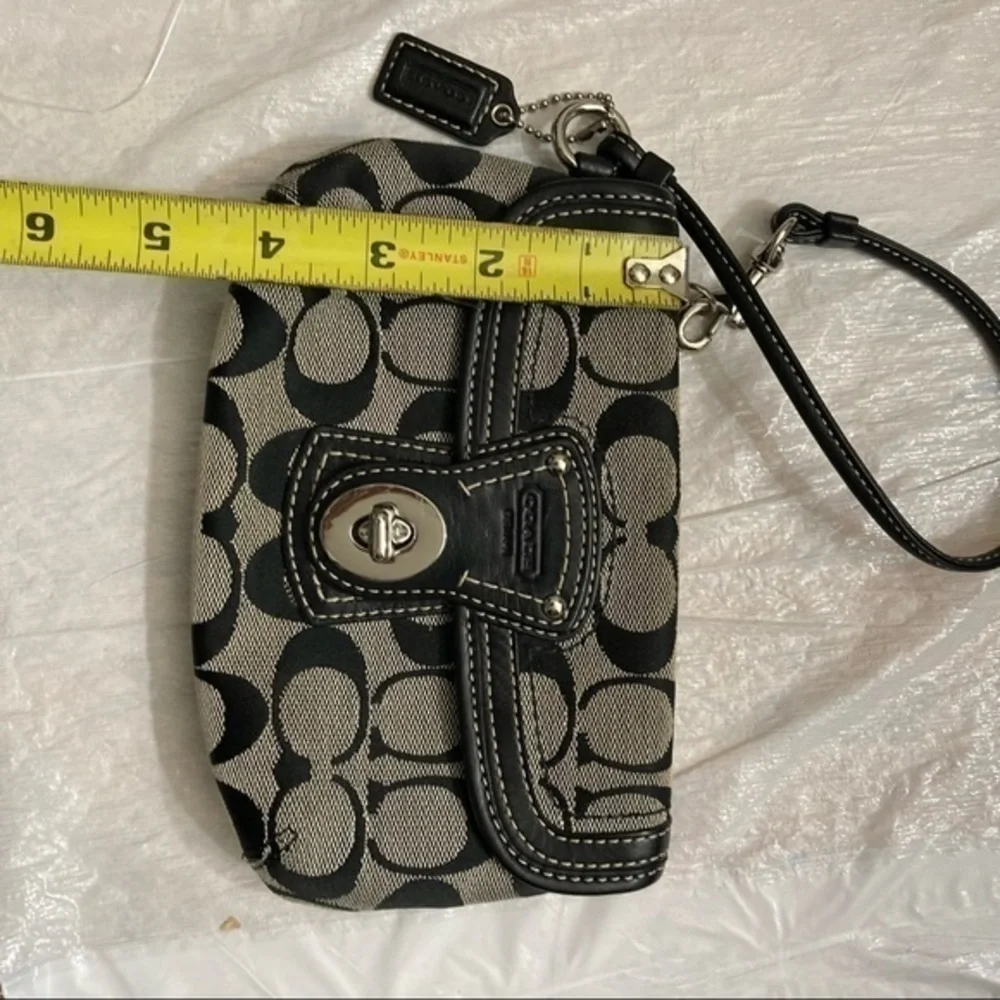 Coach black and gray signature c wristlet bag